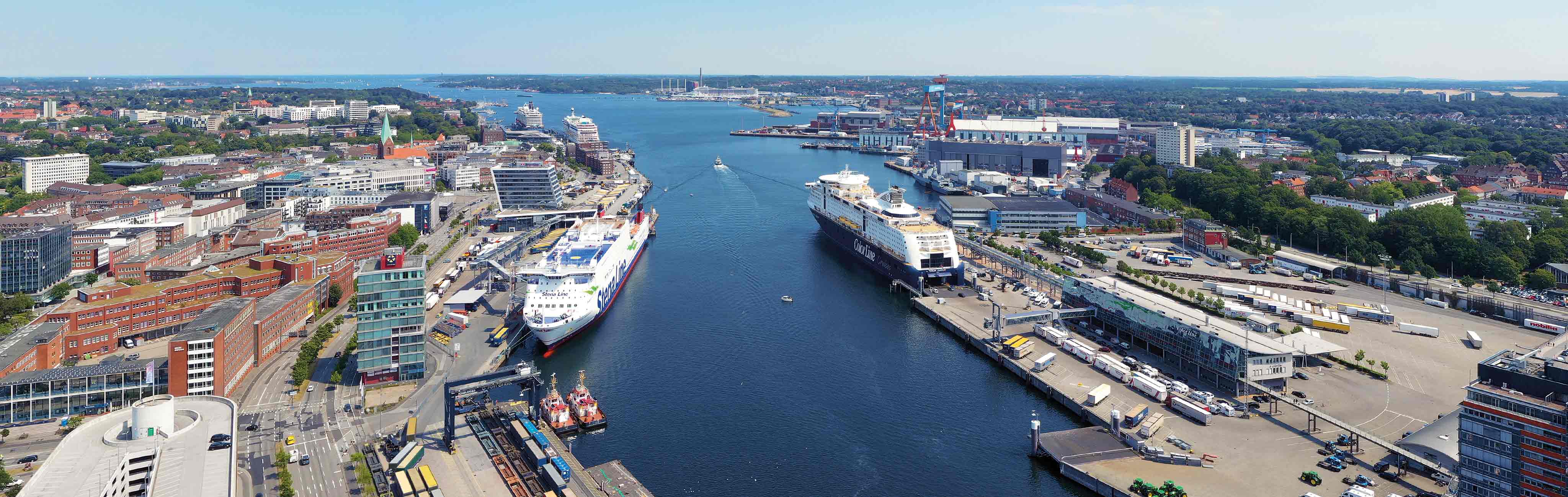 You can see the view from the city center over the harbor parts of PORT KIEL as an aerial photo.